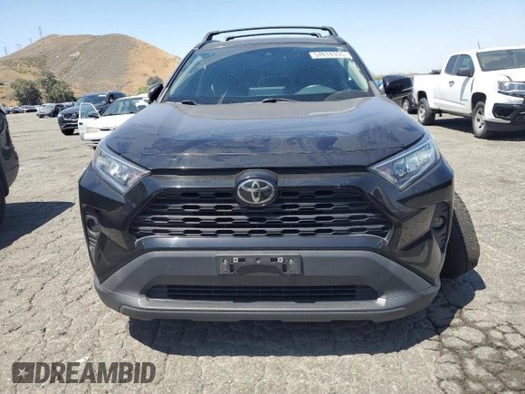 2021 Toyota RAV4 XLE with VIN 2T3P1RFV8MC167485, listed as a Copart auction lot 57814355 with 73,188 mi miles and Salvage title. Bid and sale history available at DreamBid. Image 5.