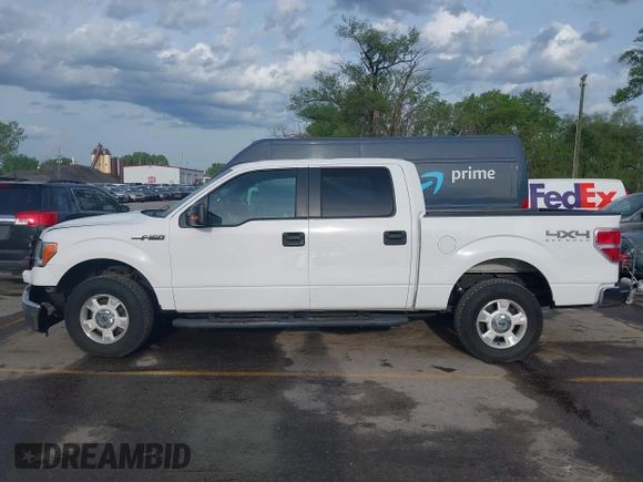 2014 Ford F-150 XL with VIN 1FTFW1EFXEKE92754, listed as a IAAI auction lot 42109551 with 219,130 mi miles. Bid and sale history available at carsss.com. Image 15.