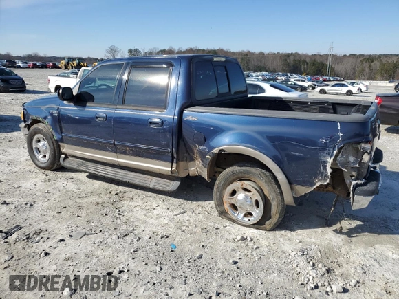 2002 Ford F-150 XLT with VIN 1FTRW07L52KA67609, listed as a Copart auction lot 87720715 with 177,615 mi miles and Salvage Title. Bid and sale history available at carsss.com. Image 2.