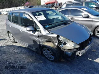2007 Honda Fit Sport z VIN JHMGD38627S014749, wystawiony jako IAAI lot #41806263 z przebiegiem 167 726 mil mil oraz . Historia ofert i sprzedaży dostępna na DreamBid. Obrazek 1.
