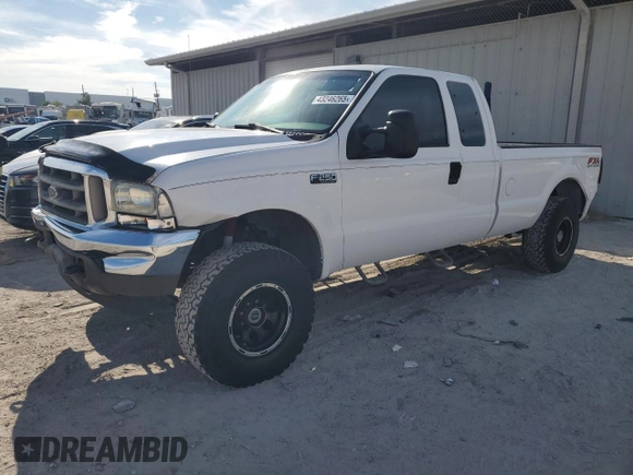 2004 Ford F-250 XL with VIN 1FTNX21L34ED23232, listed as a Copart auction lot 43246265 with 67,980 mi miles and Salvage title. Bid and sale history available at DreamBid. Image 1.