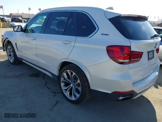 2018 BMW X5 xDrive40e iPerformance with VIN 5UXKT0C53J0W00910, listed as a IAAI auction lot 41842046 with 48,838 mi miles. Bid and sale history available at carsss.com. Image 3.