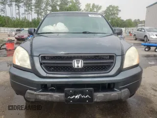 2005 Honda Pilot EX-L with VIN 5FNYF18555B060159, listed as a Copart auction lot 54165005 with 147,187 mi miles and Salvage title. Bid and sale history available at DreamBid. Image 5.