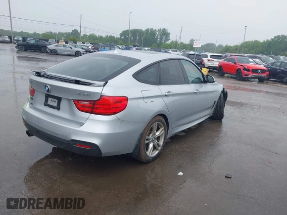 2015 BMW 3 Series 328i Gran Turismo xDrive with VIN WBA3X5C51FD561738, listed as a IAAI auction lot 42453383 with 108,752 mi miles and . Bid and sale history available at DreamBid. Image 4.