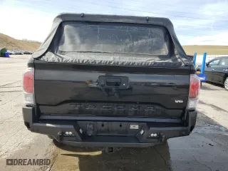 2020 Toyota Tacoma 4WD SR5 with VIN 3TMCZ5AN3LM332543, listed as a Copart auction lot 50872735 with 92,396 mi miles and Salvage Title. Bid and sale history available at carsss.com. Image 6.