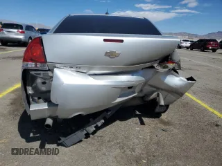 2014 Chevrolet Impala LT with VIN 2G1WB5E3XE1184419, listed as a Copart auction lot 51473045 with 98,299 mi miles and Salvage Title. Bid and sale history available at DreamBid. Image 6.