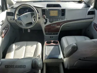 2012 Toyota Sienna XLE z VIN 5TDDK3DC5CS033868, wystawiony jako Copart lot #74727814 z przebiegiem 98 798 mil mil oraz Szkoda całkowita • Salvage title. Historia ofert i sprzedaży dostępna na DreamBid. Obrazek 8.