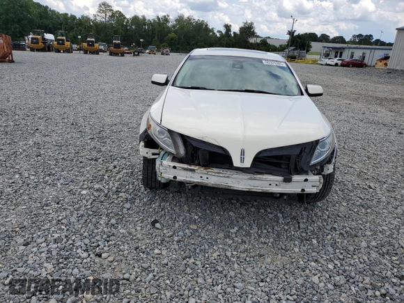 2013 Lincoln MKS with VIN 1LNHL9DK2DG604085, listed as a Copart auction lot 60325385 with 172,808 mi miles and Salvage title. Bid and sale history available at DreamBid. Image 5.