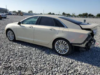 2016 Lincoln MKZ z VIN 3LN6L2G93GR615052, wystawiony jako Copart lot #54717335 z przebiegiem 86 575 mil mil oraz Szkoda całkowita • Salvage title. Historia ofert i sprzedaży dostępna na DreamBid. Obrazek 2.