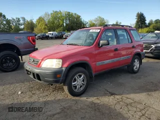 2000 Honda CR-V LX with VIN JHLRD1846YC036376, listed as a Copart auction lot 74011674 with 152,002 mi miles and Salvage Title. Bid and sale history available at carsss.com. Image 1.