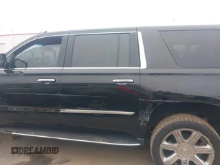 2019 Cadillac Escalade ESV Luxury z VIN 1GYS4HKJ0KR276995, wystawiony jako IAAI lot #41600945 z przebiegiem 87 701 mil mil oraz . Historia ofert i sprzedaży dostępna na DreamBid. Obrazek 14.