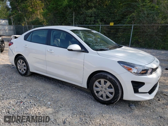 2023 Kia Rio S with VIN 3KPA24AD3PE597752, listed as a Copart auction lot 64836674 with 8,434 mi miles and Salvage Title. Bid and sale history available at carsss.com. Image 4.