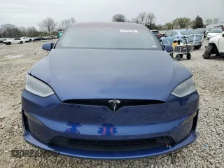 2023 Tesla Model X with VIN 7SAXCDE51PF415778, listed as a Copart auction lot 51792205 with Not Provided miles and Salvage Title. Bid and sale history available at DreamBid. Image 5.