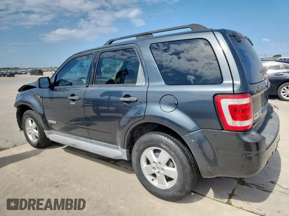 2008 Ford Escape XLT with VIN 1FMCU03128KA81939, listed as a Copart auction lot 63922515 with 182,089 mi miles and Salvage title. Bid and sale history available at DreamBid. Image 2.