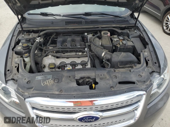 2011 Ford Taurus Limited with VIN 1FAHP2FW3BG184887, listed as a Copart auction lot 60717875 with 196,102 mi miles and Salvage title. Bid and sale history available at DreamBid. Image 11.