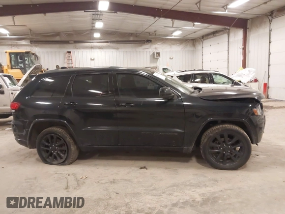 2018 Jeep Grand Cherokee Laredo E with VIN 1C4RJFAG5JC417701, listed as a IAAI auction lot 42001159 with 110,767 mi miles and . Bid and sale history available at DreamBid. Image 13.