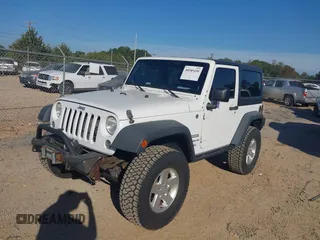 2014 Jeep Wrangler Sport with VIN 1C4AJWAG5EL176998, listed as a IAAI auction lot 40585450 with 114,432 mi miles and . Bid and sale history available at DreamBid. Image 2.