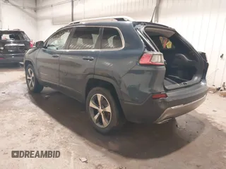 2020 Jeep Cherokee Limited with VIN 1C4PJMDX2LD516951, listed as a IAAI auction lot 41272629 with 99,717 mi miles and . Bid and sale history available at DreamBid. Image 3.