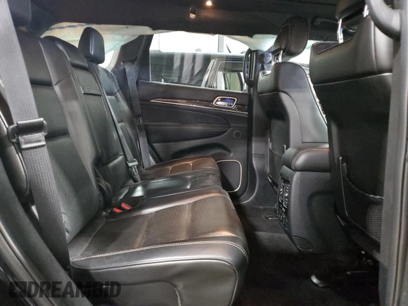 2017 Jeep Grand Cherokee Overland z VIN 1C4RJFCG0HC952054, wystawiony jako Copart lot #53045025 z przebiegiem 195 061 mil mil oraz Szkoda całkowita • Salvage title. Historia ofert i sprzedaży dostępna na DreamBid. Obrazek 11.