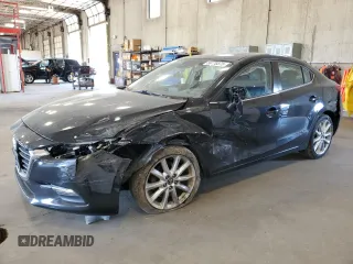 2017 Mazda 3 Touring z VIN JM1BN1V74H1115437, wystawiony jako Copart lot #56770375 z przebiegiem 70 974 mil mil oraz Szkoda całkowita • Salvage title. Historia ofert i sprzedaży dostępna na DreamBid. Obrazek 1.