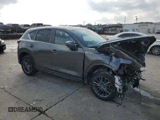 2021 Mazda CX-5 Touring with VIN JM3KFACM9M0330485, listed as a Copart auction lot 44622895 with Not Provided miles and Salvage Title. Bid and sale history available at DreamBid. Image 4.