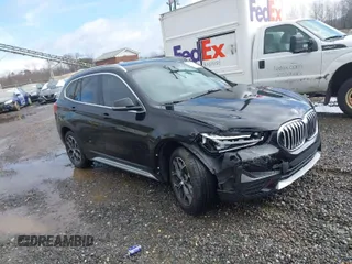 2021 BMW X1 xDrive28i with VIN WBXJG9C03M5S33561, listed as a IAAI auction lot 41541581 with 40,197 mi miles. Bid and sale history available at carsss.com. Image 1.