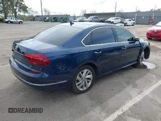 2018 Volkswagen Passat 2.0T SE with VIN 1VWBA7A30JC003243, listed as a IAAI auction lot 41895405 with 99,210 mi miles. Bid and sale history available at carsss.com. Image 4.