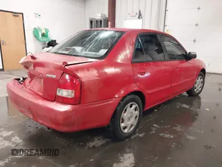 2000 Mazda Protege DX with VIN JM1BJ2220Y0258658, listed as a IAAI auction lot 41622579 with 276,682 mi miles and . Bid and sale history available at DreamBid. Image 4.