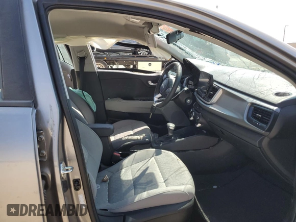 2023 Kia Rio S with VIN 3KPA24AD0PE614443, listed as a Copart auction lot 68273814 with 18,491 mi miles and Salvage Title. Bid and sale history available at DreamBid. Image 7.