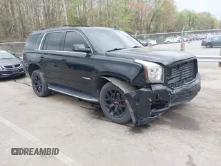 2017 GMC Yukon SLT with VIN 1GKS1BKC2HR128308, listed as a IAAI auction lot 41945770 with 158,905 mi miles. Bid and sale history available at carsss.com. Image 1.