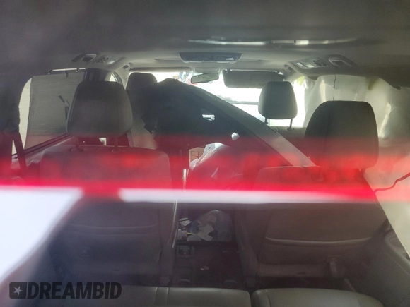 2014 Honda Odyssey Touring with VIN 5FNRL5H95EB080449, listed as a Copart auction lot 58489715 with 154,604 mi miles and Salvage title. Bid and sale history available at DreamBid. Image 8.