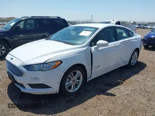 2018 Ford Fusion SE z VIN 3FA6P0LU2JR261268, wystawiony jako IAAI lot #42301578 z przebiegiem 63 357 mil mil oraz . Historia ofert i sprzedaży dostępna na DreamBid. Obrazek 17.
