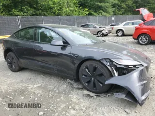 2025 Tesla Model 3 Long Range with VIN 5YJ3E1EAXSF878982, listed as a Copart auction lot 60302315 with 4,312 mi miles and Salvage title. Bid and sale history available at DreamBid. Image 4.