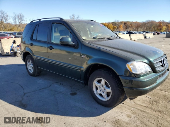 2001 Mercedes-Benz M-Class with VIN 4JGAB54E21A257928, listed as a Copart auction lot 77789424 with 98,228 mi miles and Clean Title. Bid and sale history available at carsss.com. Image 4.