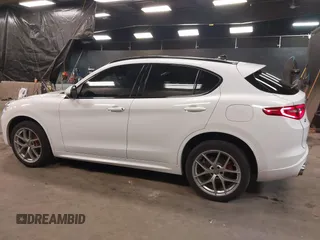 2020 Alfa Romeo Stelvio Ti z VIN ZASPAKBN9L7C92041, wystawiony jako IAAI lot #41329129 z przebiegiem 47 977 mil mil oraz . Historia ofert i sprzedaży dostępna na DreamBid. Obrazek 14.
