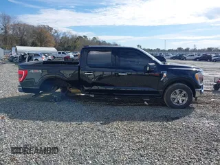 2023 Ford F-150 XL with VIN 1FTFW1E53PKG07088, listed as a IAAI auction lot 41442237 with 21,403 mi miles. Bid and sale history available at carsss.com. Image 14.