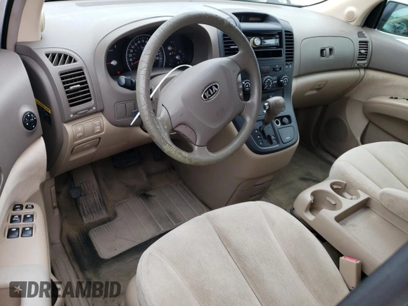 2006 Kia Sedona LX with VIN KNDMB233466022537, listed as a Copart auction lot 71130354 with 215,997 mi miles and Salvage Title. Bid and sale history available at carsss.com. Image 8.
