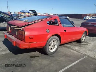 1983 Datsun 280ZX z VIN JN1HZ04S4DX568496, wystawiony jako Copart lot #57705145 z przebiegiem 328 479 mil mil oraz Tytuł czysty. Historia ofert i sprzedaży dostępna na DreamBid. Obrazek 3.