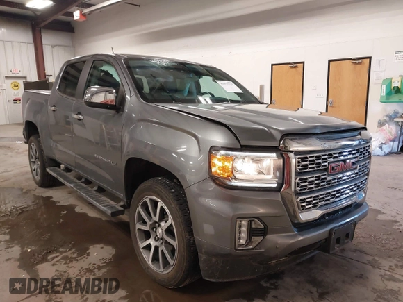 2021 GMC Canyon 4WD Denali with VIN 1GTG6EEN4M1287194, listed as a IAAI auction lot 41571729 with 21,704 mi miles. Bid and sale history available at carsss.com. Image 1.
