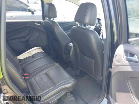 2015 Ford Escape Titanium with VIN 1FMCU9J96FUC01790, listed as a IAAI auction lot 42844336 with 133,005 mi miles and . Bid and sale history available at DreamBid. Image 8.