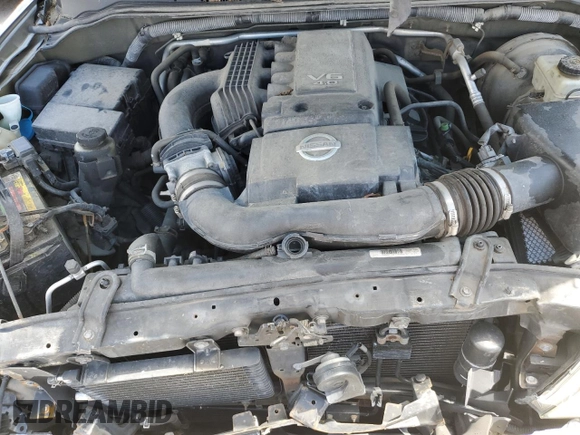 2005 Nissan Frontier LE z VIN 1N6AD06W45C406094, wystawiony jako Copart lot #54011914 z przebiegiem 165 293 mil mil oraz Szkoda całkowita • Salvage title. Historia ofert i sprzedaży dostępna na DreamBid. Obrazek 11.