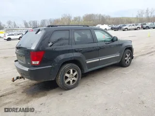 2009 Jeep Grand Cherokee Laredo with VIN 1J8GR48K19C546439, listed as a IAAI auction lot 42097256 with 146,930 mi miles. Bid and sale history available at carsss.com. Image 4.