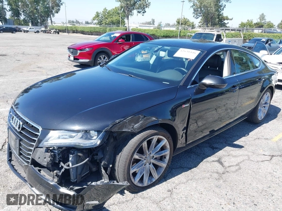 2013 Audi A7 Premium Plus with VIN WAUYGAFCXDN132677, listed as a IAAI auction lot 42630446 with 132,398 mi miles and . Bid and sale history available at DreamBid. Image 2.