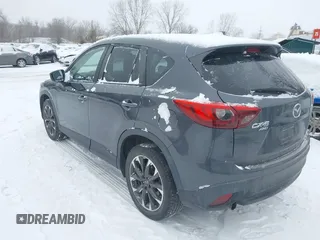 2016 Mazda CX-5 Grand Touring with VIN JM3KE4DY2G0913412, listed as a IAAI auction lot 41616132 with 85,166 mi miles. Bid and sale history available at carsss.com. Image 3.