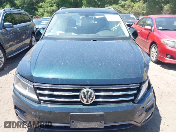 2018 Volkswagen Tiguan SEL with VIN 3VV2B7AX9JM058518, listed as a IAAI auction lot 42558129 with 82,807 mi miles and . Bid and sale history available at DreamBid. Image 12.