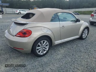 2015 Volkswagen Beetle with VIN 3VW5A7AT9FM815899, listed as a Copart auction lot 63074125 with 77,214 mi miles and Salvage title. Bid and sale history available at DreamBid. Image 3.