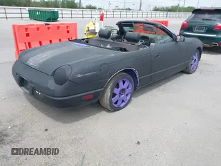 2002 Ford Thunderbird w/Hardtop Premium with VIN 1FAHP60A32Y105748, listed as a IAAI auction lot 41964399 with 1 mi miles. Bid and sale history available at carsss.com. Image 4.
