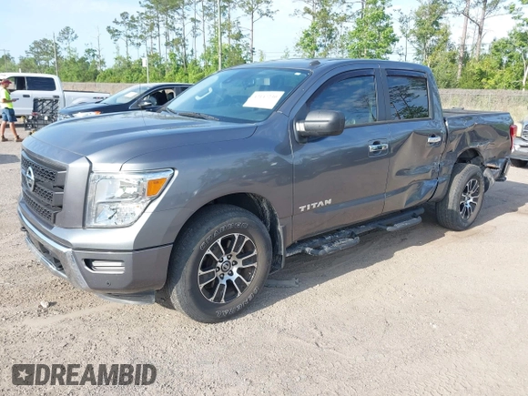 2021 Nissan Titan Pro-4X with VIN 1N6AA1ED0MN518084, listed as a IAAI auction lot 42147230 with 41,496 mi miles and . Bid and sale history available at DreamBid. Image 2.