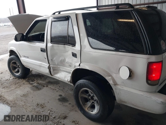 2004 Chevrolet Blazer LS z VIN 1GNDT13X64K129093, wystawiony jako IAAI lot #41860109 z przebiegiem 175 588 mil mil oraz . Historia ofert i sprzedaży dostępna na DreamBid. Obrazek 6.