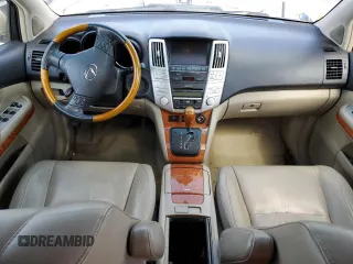 2008 Lexus RX 400h with VIN JTJGW31UX82007745, listed as a Copart auction lot 52857445 with 159,062 mi miles and Salvage Title. Bid and sale history available at DreamBid. Image 8.